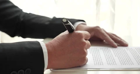 Asian business man using pen signing on new contract to starting projects in con Video stock 205989959