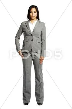 Asian business woman serious and confident looking at camera Stock Photos
