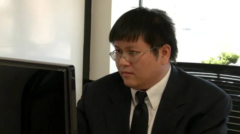 Asian Businessman at Computer Stock-Footage 32420943