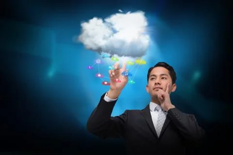 Asian businessman pointing to cloud and app icons Ilustração Stock