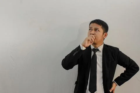 Asian businessman thinking something Foto stock