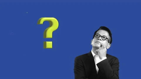 Asian businessman thinking something with question marks on blue background. Stock Footage 234156751