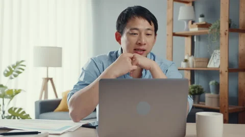 Asian businessman using computer laptop talk to colleagues in video call. Stock Footage 152172191