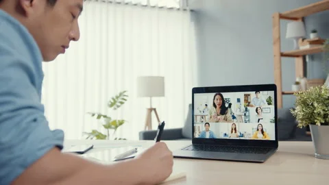 Asian businessman using computer laptop talk to colleagues in video call. Video stock 152173167