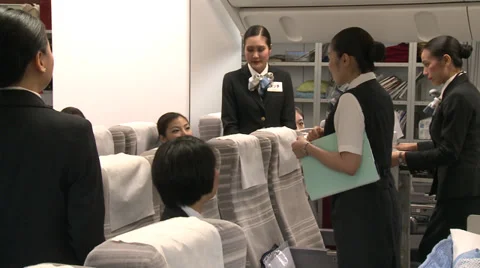 Asian cabin crew in training Stock Footage 31258559