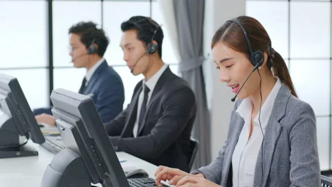 Asian call center team, customer service, telesales in formal suit Stock Footage 143883053