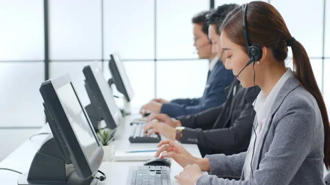 Asian call center team, customer service, telesales in formal suit Stock Footage
