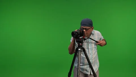 Asian camera man using tripod and camera Stock Footage 252871213