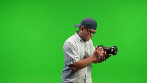 Asian camera man using tripod and camera Stock Footage 252871458