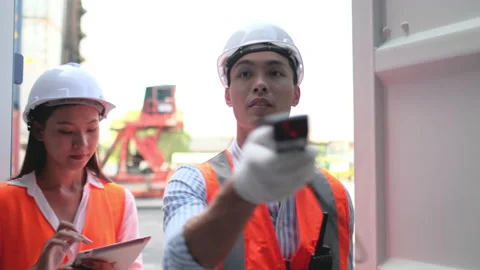 Asian cargo container worker man open door of container then use barcode scanner Stock Footage 146454913