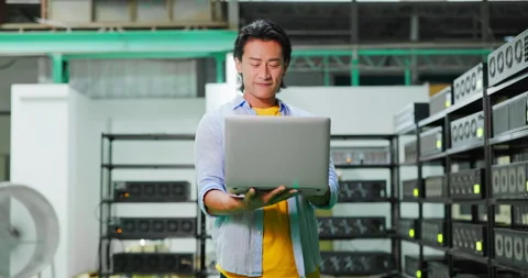 Asian check crypto mining machine Stock Footage 201807460