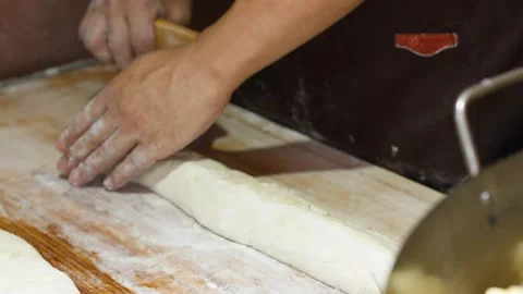 Asian Chef Kneading and Cutting Bread Dough with Bench Scraper 库存影片 341300847