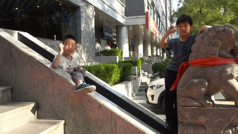 Asian children are looking at the camera Stock Footage 116349264