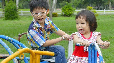 Asian children on the carousel Stock Footage 54090232