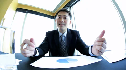 Asian Chinese Male Using Wireless Audio Visual Communication Stock Footage 33531378