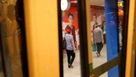 Asian commuters in city train Video stock 119712229