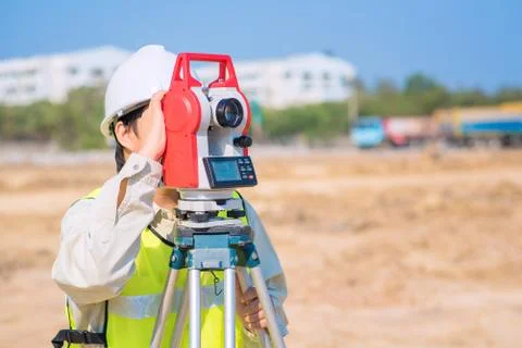 Asian construction engineer checking construction site for new Infrastructure Foto stock