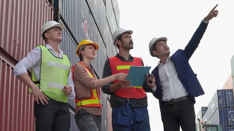 Asian construction engineer point hand showing and talking of new project Stock Footage 136316310