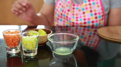 Asian cook squeeze lemon Stock Footage 66508909