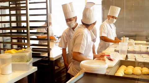 Asian Cooks in the Bakery Kitchen Stock Footage 62421158