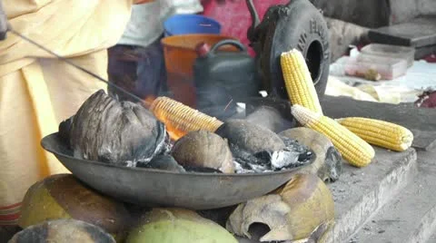 Asian cooks corn Видео 10791991