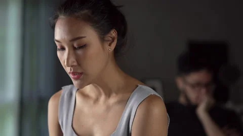 Asian couple arguing at home. Problems in relationship. Stock Footage 196658430