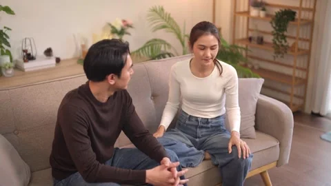 Asian couple experiencing relationship argument expressing frustration duri.. Stock Footage 333500886