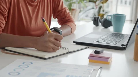 Asian creative woman write idea planning big project to notebook during work Video stock 139866383