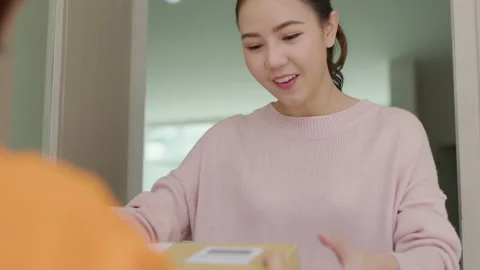 Asian customer receive box send home delivery service parcel postal. 動画素材 155467275