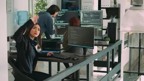 Asian data admin working with hologram and coding language Video stock 221749761