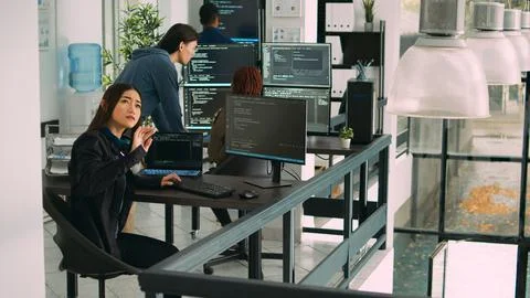 Asian data admin working with hologram and coding language Stock Photos