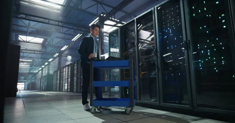 Asian Data Center Engineer Using Laptop Computer Stockbeeldmateriaal 320000239