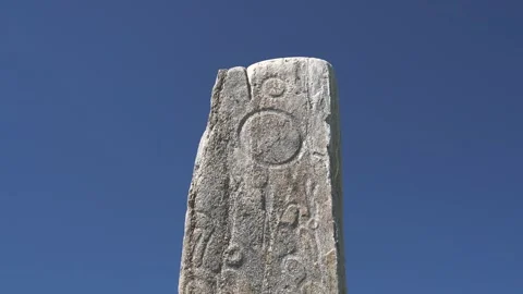 Asian deer stone monument bears ritual symbols - Funerary Stele and Animal Style Stock Footage 340608450