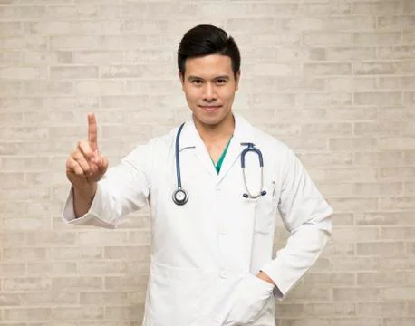 Asian doctor in white coat Stock Photos