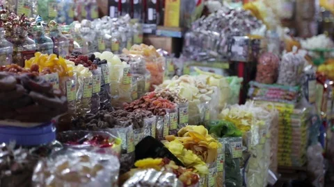Asian Dried Fruit and Candy for Sale in Market Stock Footage 78202812