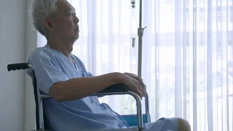 Asian elderly man disable in wheel chair depressed lonely and hopeless. Think Stock Footage 169026668