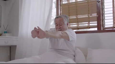 Asian Elderly man wake up and happy in bedroom. Stock Footage 152606618