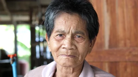 Asian elderly native woman looking to camera with closeup face Video stock 172851459