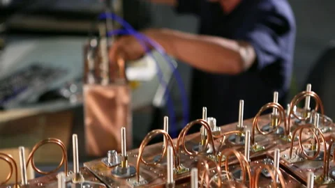 Asian electrical engineer with tools testing computer component Stock Footage 139071898