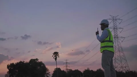 Asian electrical engineer working with radio walkie talkie and look forward. Video stock 149804944