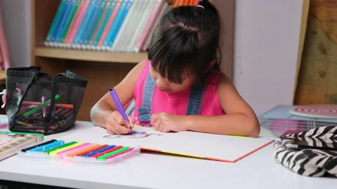  Asian elementary school girl learning to draw in the classroom. Stock Footage 201180598