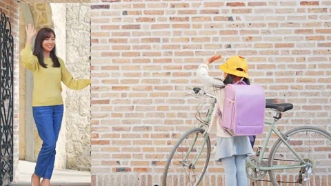 Asian elementary school student and mother going to school. Stock Footage 165966010
