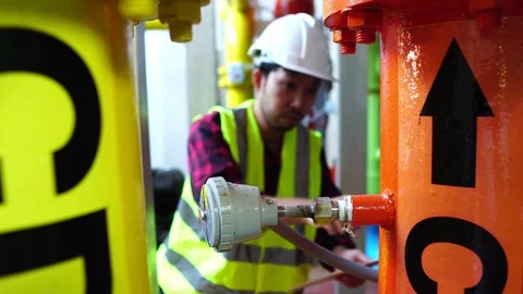 Asian Engineer checking list Cooling system,For the safety of the system Stock Footage 106436511