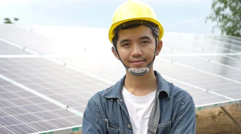 Asian engineer checking solar panel setup with tablet, Pan shot Stock Footage 51928752