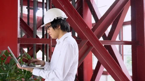 Asian engineer man working with laptop computer at construction site. Stock-Footage 90626433