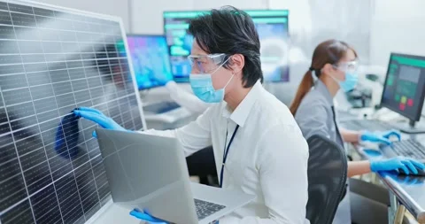 Asian engineer with solar panel Stock Footage 166834596