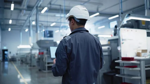 Asian Engineer Using Laptop Computer in Factory Video stock 282879382