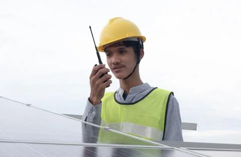 Asian engineer using radio. Stock Photos