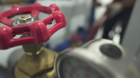 Asian engineer working in the boiler room Stock Footage 248235255