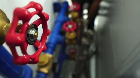 Asian engineer working in the boiler room Stock Footage 248236864